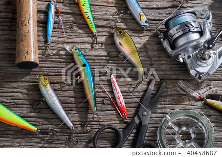 Fishing accessories, wobblers and poppers in closeup Fishing accessories, wobblers and poppers in closeup 140458687