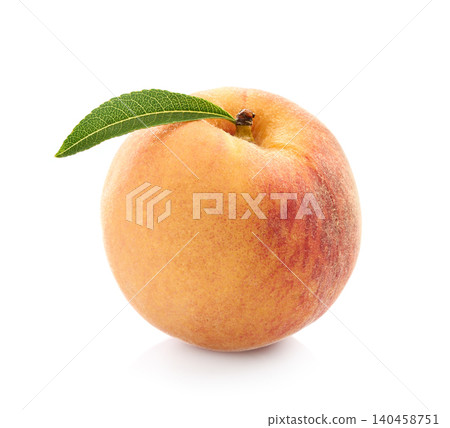 Peach with leaves in closeup on white background 140458751