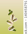 Flying pistachio nuts in closeup on pistachio background 140458791