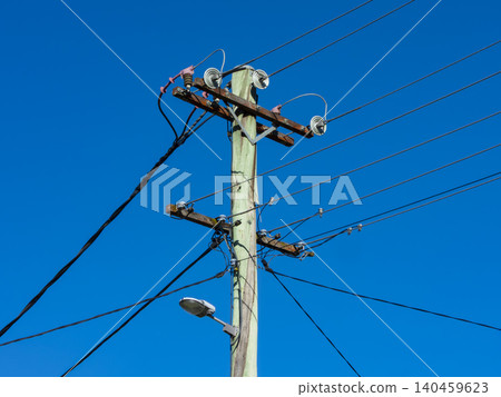 An old and weathered wooden telephone pole in the Blue Mountains 140459623