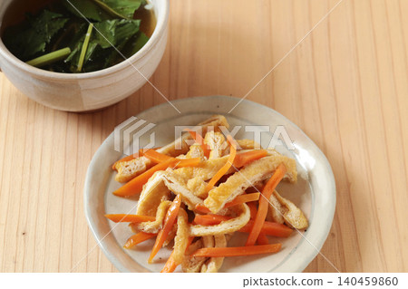 Simmered carrots and fried tofu Simmered carrots and fried tofu 140459860