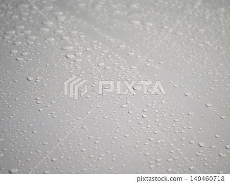 Raindrops accumulating on the hood Raindrops accumulating on the hood 140460718