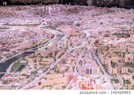Miniature model presents an accurate representation of Moscows city layout, highlighting key buildings, streets, and green spaces from an elevated view. Miniature model presents an accurate representation of Moscows city layout, highlighting key buildings, streets, and green spaces from an elevated view. 140460965