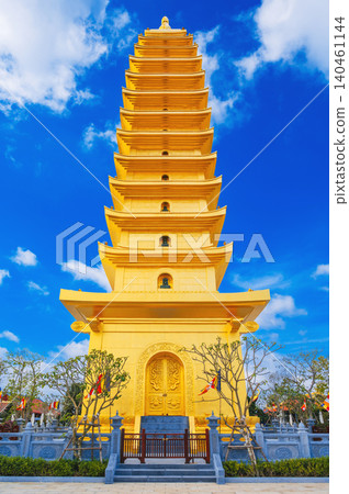 golden tower on the Vietnamese Buddhist pagoda Truc Lam Phung Thuy Son in Nha Trang in Vietnam at the top of mountain. Famous landmark and travel in Asia golden tower on the Vietnamese Buddhist pagoda Truc Lam Phung Thuy Son in Nha Trang in Vietnam at the top of mountain. Famous landmark and travel in Asia 140461144