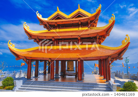 beautiful gate at the Vietnamese Buddhist Golden Pagoda Truc Lam Phung Thuy Son on mountain in Nha Trang city in Vietnam in Asia beautiful gate at the Vietnamese Buddhist Golden Pagoda Truc Lam Phung Thuy Son on mountain in Nha Trang city in Vietnam in Asia 140461169