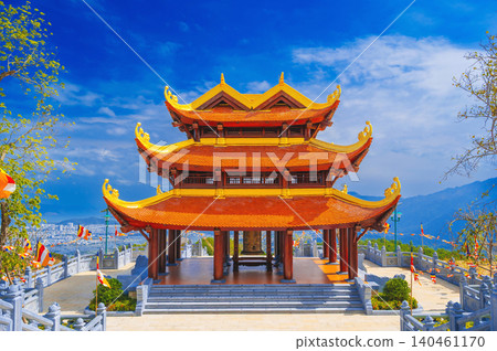 gate at the Vietnamese Buddhist Golden Pagoda Truc Lam Phung Thuy Son on the mountain in Nha Trang city in Vietnam in Asia gate at the Vietnamese Buddhist Golden Pagoda Truc Lam Phung Thuy Son on the mountain in Nha Trang city in Vietnam in Asia 140461170