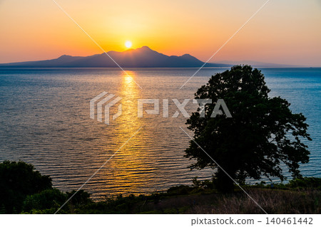 Sunset over Mount Unzen and the Ariake Sea in Nagasaki, taken from Mikoshikura Coast. Sunset over Mount Unzen and the Ariake Sea in Nagasaki, taken from Mikoshikura Coast. 140461442