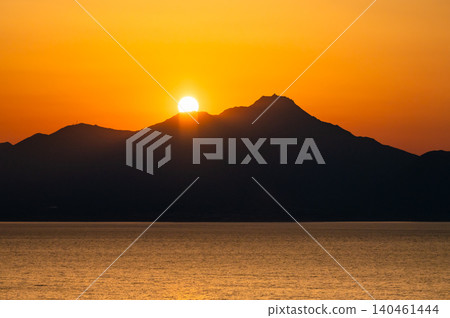 Sunset over Mount Unzen and the Ariake Sea in Nagasaki, taken from Mikoshikura Coast. Sunset over Mount Unzen and the Ariake Sea in Nagasaki, taken from Mikoshikura Coast. 140461444