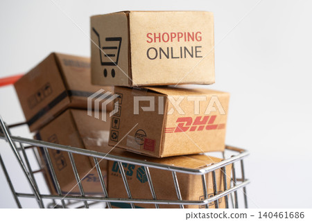 Bangkok, Thailand September 26, 2022 Shopping cart with DHL Amazon and FedEx express packing box, import export online exchange investment business. Bangkok, Thailand September 26, 2022 Shopping cart with DHL Amazon and FedEx express packing box, import export online exchange investment business. 140461686