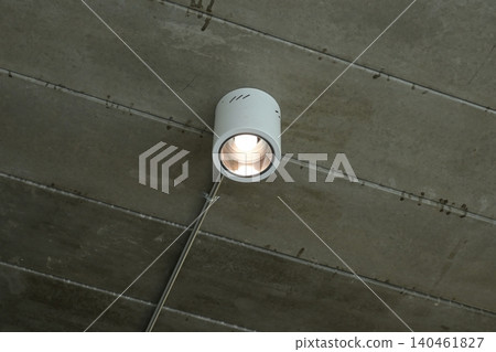 white light bulb on grey ceiling, interior design 140461827