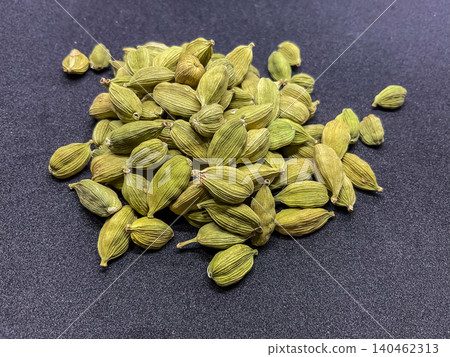 green cardamom pods (Elettaria cardamomum). These aromatic whole spices green cardamom pods (Elettaria cardamomum). These aromatic whole spices 140462313