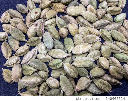 green cardamom pods (Elettaria cardamomum). These aromatic whole spices green cardamom pods (Elettaria cardamomum). These aromatic whole spices 140462314