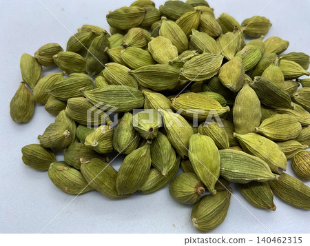 green cardamom pods (Elettaria cardamomum). These aromatic whole spices green cardamom pods (Elettaria cardamomum). These aromatic whole spices 140462315