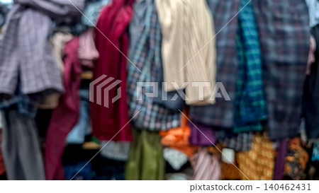 Defocused Retail Fashion Shop Display with Plaid Shirts Defocused Retail Fashion Shop Display with Plaid Shirts 140462431