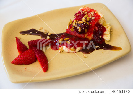 Pastry with custard and cherry jam Pastry with custard and cherry jam 140463320