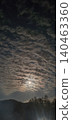 Scale-like clouds illuminated by moonlight 140463360
