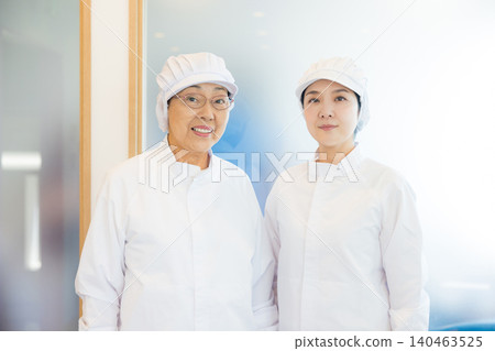 Part-time staff working in white coats Part-time staff working in white coats 140463525