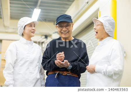 Part-time staff working in white coats Part-time staff working in white coats 140463563
