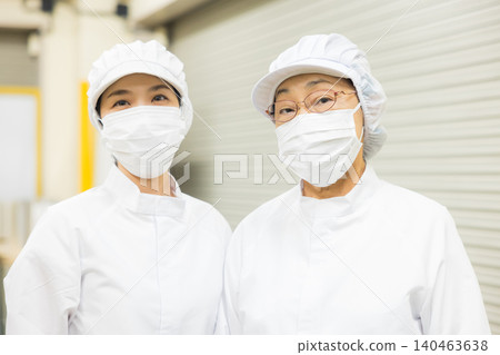 Part-time staff working in white coats Part-time staff working in white coats 140463638