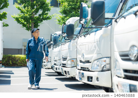 trucks lined up in parking lot trucks lined up in parking lot 140463888