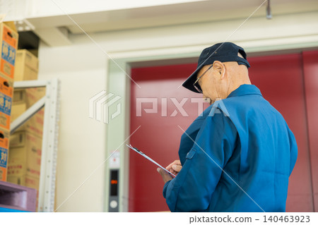 Men working at the factory Men working at the factory 140463923