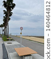 A bus stop with a view of the sea (vertical orientation) 140464812
