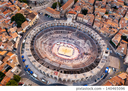 Drone view of antique Roman amphitheater in Arles town, France Drone view of antique Roman amphitheater in Arles town, France 140465096