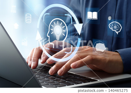 Talent reskilling strategies and solutions. Employee training and skill development. E-learning on laptops. 140465275