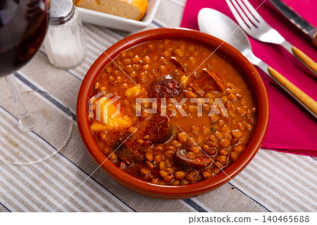 Stewed lentils with sausages, spanish Riojan lentils Stewed lentils with sausages, spanish Riojan lentils 140465688