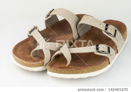 Stylish sandals on a white background for summer fashion ideas Stylish sandals on a white background for summer fashion ideas 140465870