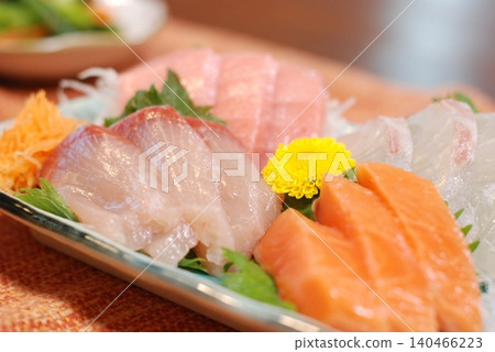 Sashimi served on a plate Sashimi served on a plate 140466223