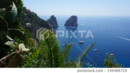 Beautiful coastline - Faraglioni rocks at Capri In Naples, Italy. Beach landscape. Beautiful coastline - Faraglioni rocks at Capri In Naples, Italy. Beach landscape. 140466729