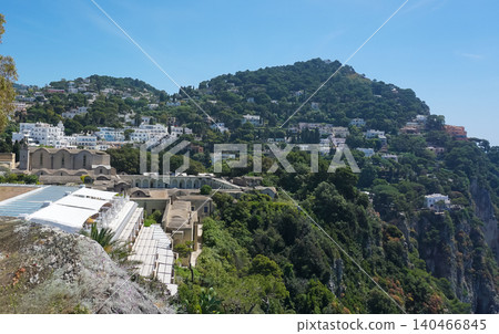 Coastal slopes of the island Capri with luxurious villas located on them. 140466845