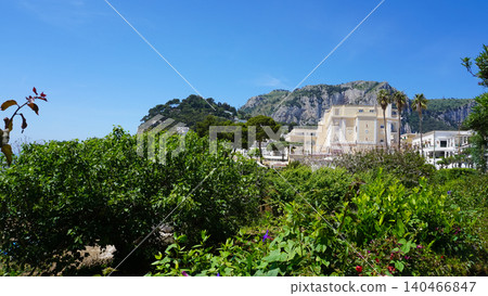 Coastal slopes of the island Capri with luxurious villas located on them. Coastal slopes of the island Capri with luxurious villas located on them. 140466847
