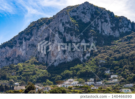 Coastal slopes of the island Capri with luxurious villas located on them. Coastal slopes of the island Capri with luxurious villas located on them. 140466890