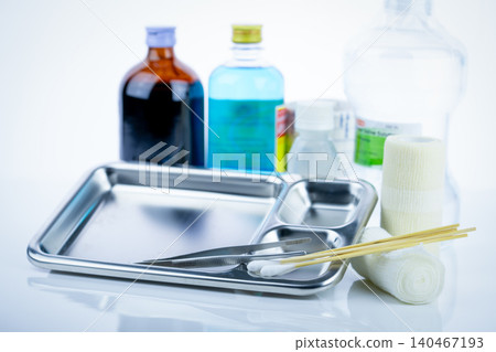 Medical equipment for treating infections. Wound care dressing set. Medical supplies for nurses. Conform bandage, forceps, cotton stick, alcohol. Sterile dressing materials. Healthcare equipment. Medical equipment for treating infections. Wound care dressing set. Medical supplies for nurses. Conform bandage, forceps, cotton stick, alcohol. Sterile dressing materials. Healthcare equipment. 140467193