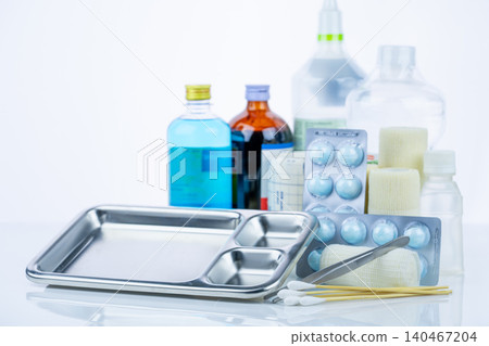 Medical equipment for treating infections. Wound care dressing set. Medical supplies for nurses. Conform bandage, forceps, cotton stick, alcohol. Sterile dressing materials. Healthcare equipment. Medical equipment for treating infections. Wound care dressing set. Medical supplies for nurses. Conform bandage, forceps, cotton stick, alcohol. Sterile dressing materials. Healthcare equipment. 140467204