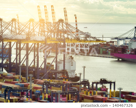 Logistics and transportation of container cargo ship at ship port. Container truck and crane bridge in shipyard. Import export and transport industry. Terminal port for export transport by ship. 140467326