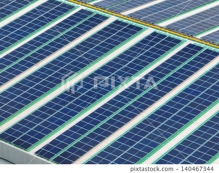 Solar energy for factory and warehouse building. Solar panels on roof of industrial plant. Commercial solar power. Rooftop solar power. Rooftop renewable energy system. Sustainable green energy. Solar energy for factory and warehouse building. Solar panels on roof of industrial plant. Commercial solar power. Rooftop solar power. Rooftop renewable energy system. Sustainable green energy. 140467344