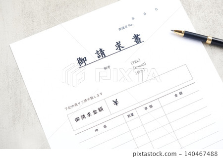 Invoice - Image of a business scene where an invoice is prepared for a business partner Invoice - Image of a business scene where an invoice is prepared for a business partner 140467488