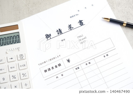 Invoice - Image of a business scene where an invoice is prepared for a business partner Invoice - Image of a business scene where an invoice is prepared for a business partner 140467490
