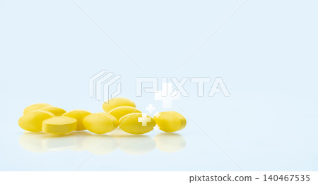 Yellow tablets pill with white cross symbol on white background. Health and medical care concept. Health insurance. Pharmacy department banner in hospital. Pharmaceutical industry. Pharmacy product. Yellow tablets pill with white cross symbol on white background. Health and medical care concept. Health insurance. Pharmacy department banner in hospital. Pharmaceutical industry. Pharmacy product. 140467535