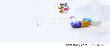 Antibiotic capsule pills and prescription drugs banner with doctor and stethoscope background. Healthcare and medicine. Medical care in hospital. Antibiotic drug selection. Antibiotic drug resistance. Antibiotic capsule pills and prescription drugs banner with doctor and stethoscope background. Healthcare and medicine. Medical care in hospital. Antibiotic drug selection. Antibiotic drug resistance. 140467603