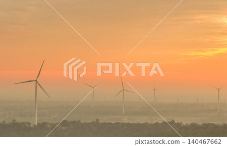 Landscape wind farm with sunrise sky. Sustainable renewable energy. Wind power for sustainability. Green technology. Sustainable development. Wind turbines generate electricity. Energy sustainability. 140467662