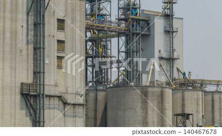 Animal feed factory. Agricultural silos, grain storage silos. Agriculture industry. Rural agribusiness. Grain storage innovation. Agricultural silos at animal feed factory. Sustainable farming. 140467678
