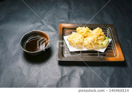Enjoy a Japanese meal with a tempura assortment that's crispy on the outside and fluffy on the inside. Enjoy a Japanese meal with a tempura assortment that's crispy on the outside and fluffy on the inside. 140468814