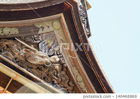 Exquisite dragon carvings on the roof of a temple steeped in history Exquisite dragon carvings on the roof of a temple steeped in history 140468869