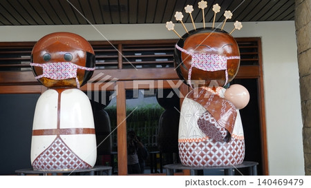 Loro Blonyo Statues with Masks Traditional Javanese Dolls Loro Blonyo Statues with Masks Traditional Javanese Dolls 140469479
