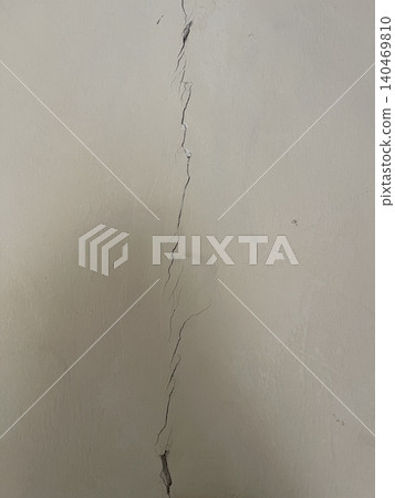Severe Vertical Wall Crack Closeup Showing Structural Damage 140469810