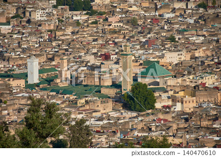 An aerial perspective reveals the complex historical architecture and mosques of the ancient city of Fez in Morocco An aerial perspective reveals the complex historical architecture and mosques of the ancient city of Fez in Morocco 140470610